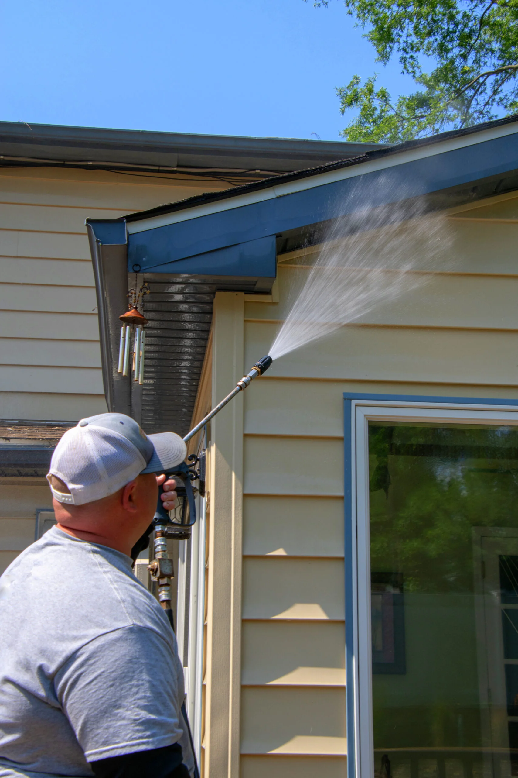 Siding damage and buildup before cleaning