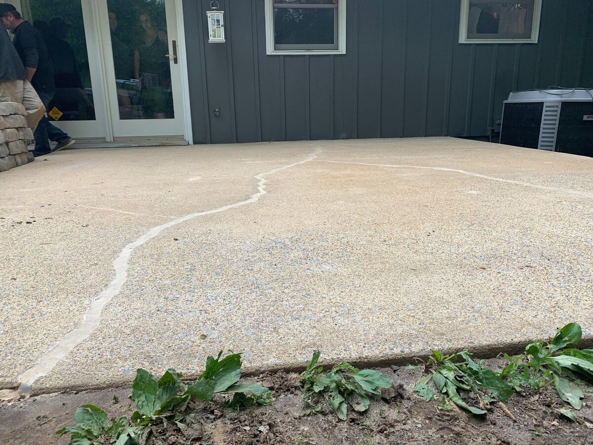 Patio damage before repair